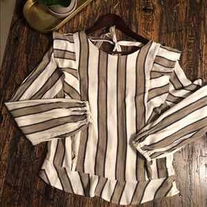 Isabella Sinclair from Anthropologie ruffle top